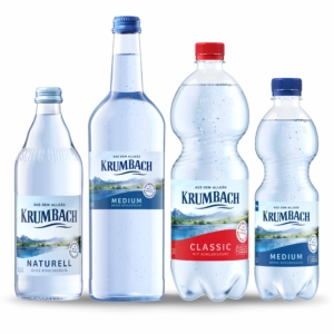 Vier Krumbach Mineralwasserflaschen in Glas und PET: Naturell, Medium und Classic