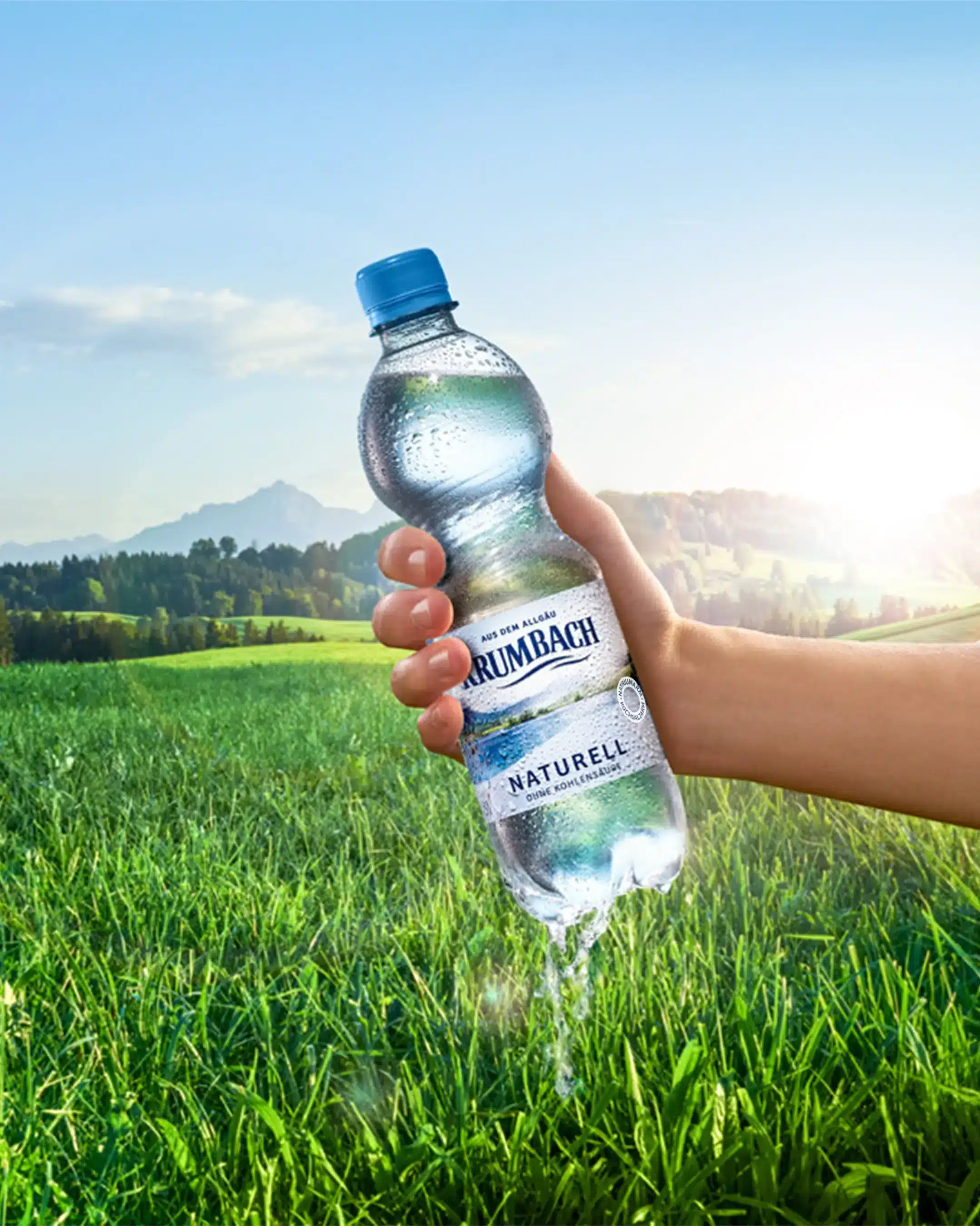 krumbach-blog-weltwassertag-2022-mineralwasser-naturell-berglandschaft-header-mobil
