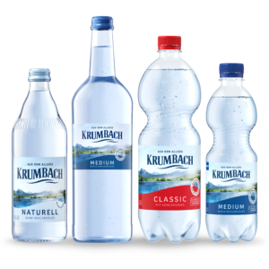 Vier Krumbach Mineralwasserflaschen in Glas und PET: Naturell, Medium und Classic