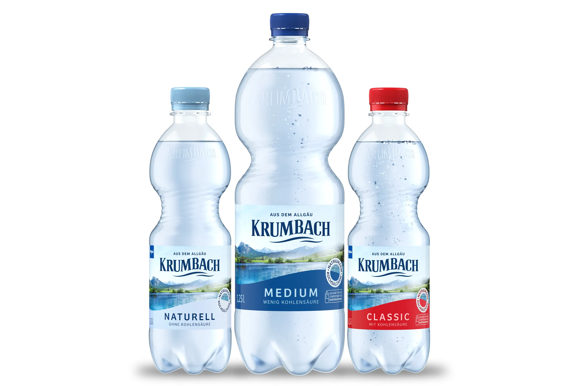 Krumbach PET-Einwegflaschen mit Naturell, Medium und Classic Mineralwasser vor weißem Hintergrund